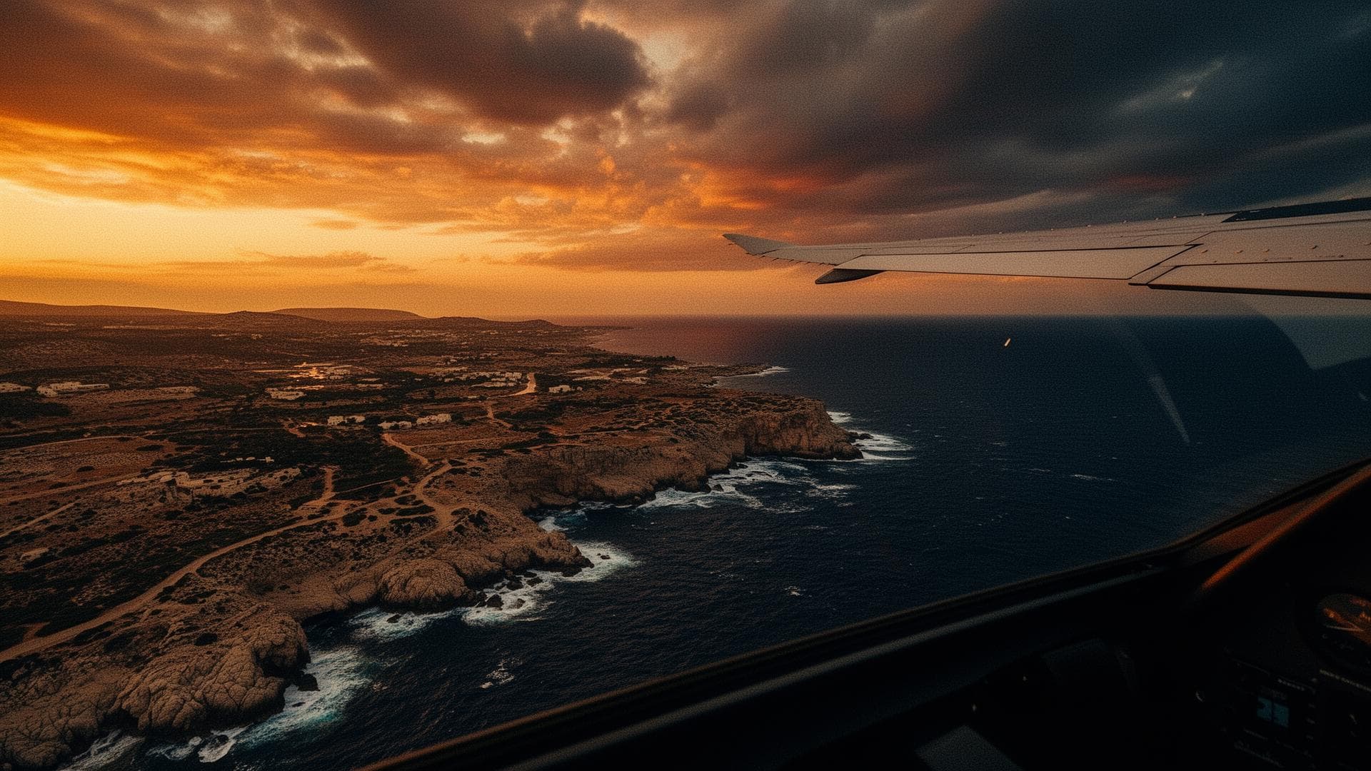 Sunset view from an aircraft cockpit above Cyprus