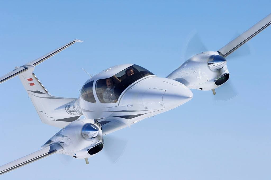 Diamond DA42 twin-engine aircraft in flight